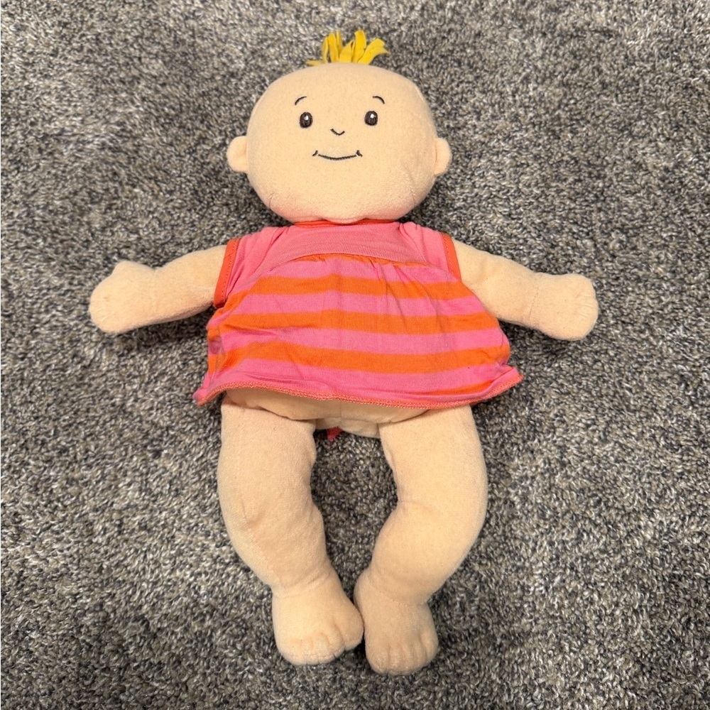 Wee baby still doll with dress